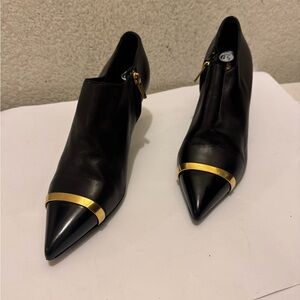 Yves Saint Laurent Black and Gold Heels